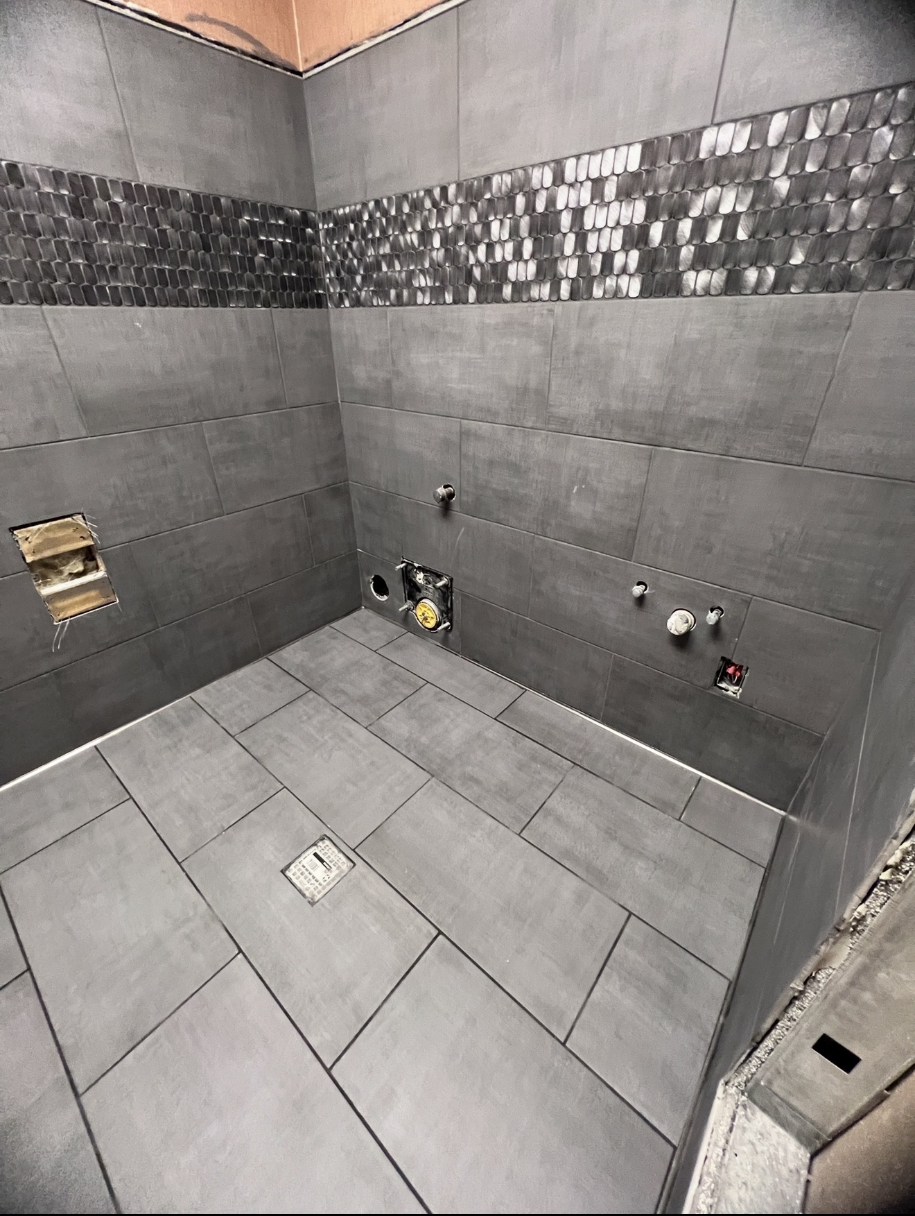 Commercial restroom tile and trim detail