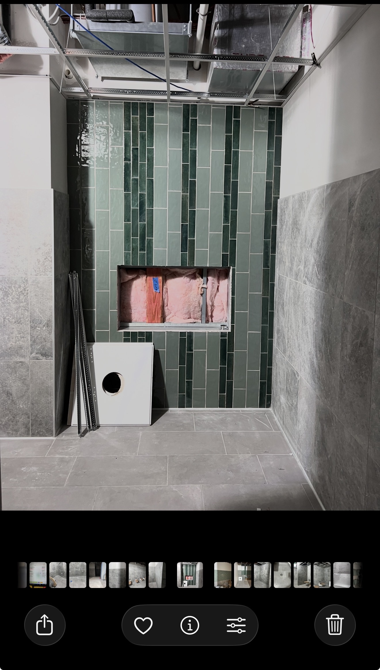 Vertical accent tile installation in progress